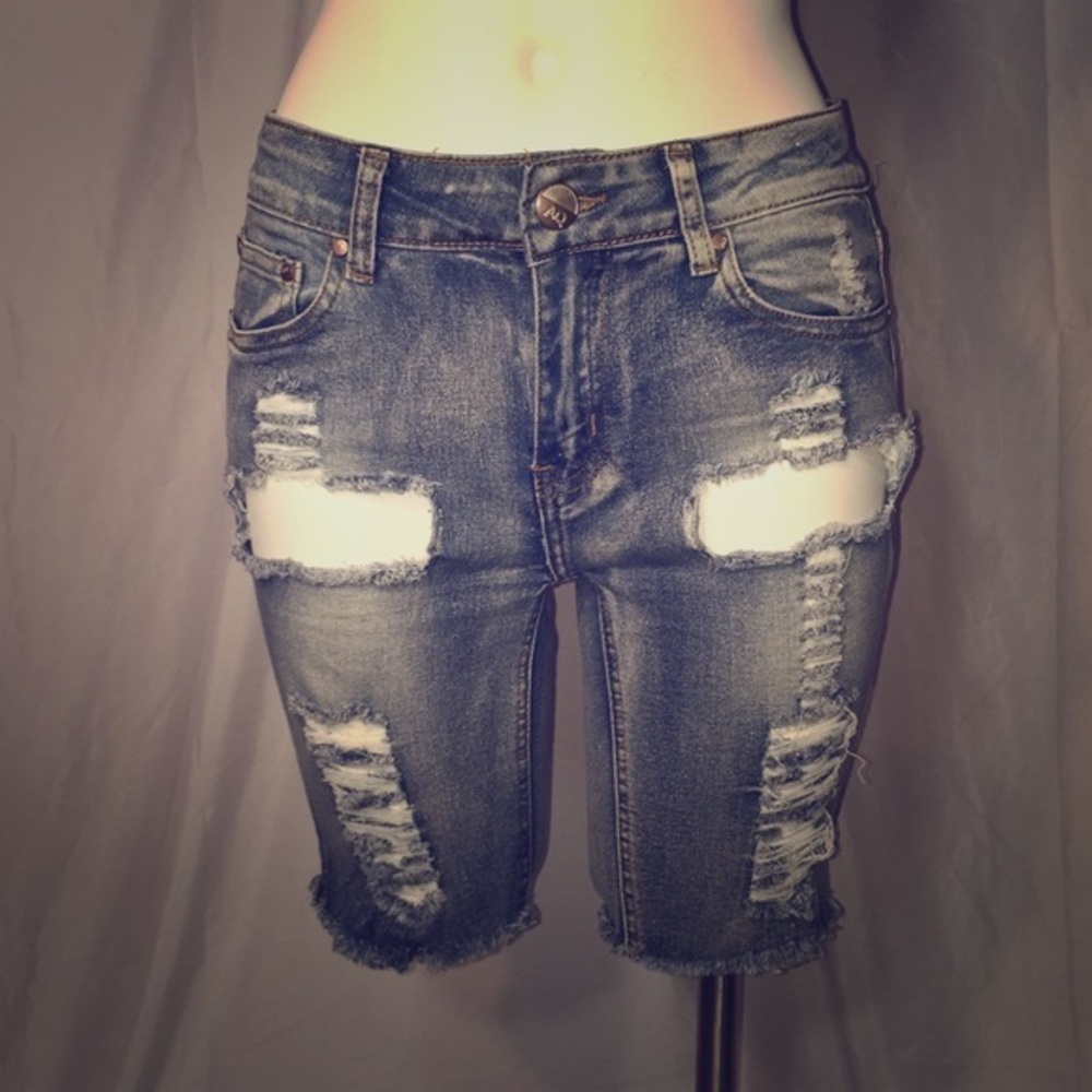 AQ cut off distressed denim long shorts.